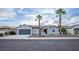 Charming single-story home with a well-maintained front yard and a two-car garage at 2099 Mountain City St, Henderson, NV 89052