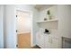Bright hallway with storage cabinets, marble counter, and view of a bedroom at 2099 Mountain City St, Henderson, NV 89052