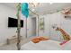 Bright bedroom with a canopy bed and a view to the hall at 2240 Boutique Ave, Henderson, NV 89044