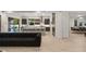 Open kitchen with an island, bar seating, and stainless steel appliances at 2240 Boutique Ave, Henderson, NV 89044