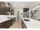 Stylish kitchen featuring white countertops, modern cabinets, stainless steel appliances, and a sleek design at 2240 Boutique Ave, Henderson, NV 89044