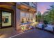 Relaxing outdoor patio with cozy seating, ambient lighting, and a beautiful view at 2240 Boutique Ave, Henderson, NV 89044