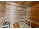 Inviting sauna with wood paneling, bench seating, and a tranquil atmosphere at 2240 Boutique Ave, Henderson, NV 89044