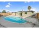 The backyard features a private swimming pool, concrete patio, and mature landscaping at 2801 Emmons Ave, North Las Vegas, NV 89030