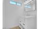 Stylish bathroom with a modern white vanity and ample natural light from the window at 2801 Emmons Ave, North Las Vegas, NV 89030