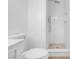 Modern bathroom featuring a new toilet, and walk-in shower, perfect for relaxing at 2801 Emmons Ave, North Las Vegas, NV 89030