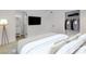 Bright bedroom featuring a TV, closet and an ensuite bathroom for added privacy at 2801 Emmons Ave, North Las Vegas, NV 89030