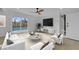 The living room features a modern design, lots of light, and access to the back yard at 2801 Emmons Ave, North Las Vegas, NV 89030