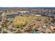 Aerial view showcasing community amenities including a park, playground, tennis courts, and green space at 3924 Diamond Ridge St, Las Vegas, NV 89129
