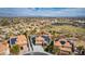 Beautiful aerial perspective capturing the neighborhood featuring the property with a pool and solar panels at 3924 Diamond Ridge St, Las Vegas, NV 89129