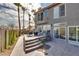 Outdoor patio featuring a grill and seating with views of a lush lawn, garden, and ample space for entertaining at 3924 Diamond Ridge St, Las Vegas, NV 89129