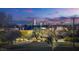 Scenic view of the city skyline at dusk, showcasing a vibrant cityscape and lush green spaces at 3924 Diamond Ridge St, Las Vegas, NV 89129