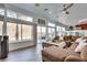 Bright living room with a large window offering ample natural light and a view of the backyard at 3924 Diamond Ridge St, Las Vegas, NV 89129