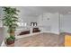 A cozy living space with wood-look floors and large windows at 3924 Diamond Ridge St, Las Vegas, NV 89129