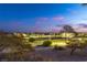 Scenic view of a community park from an elevated perspective during twilight hours, highlighting a tranquil atmosphere at 3924 Diamond Ridge St, Las Vegas, NV 89129