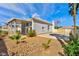 Spacious backyard featuring low-maintenance landscaping, a covered patio, and room for outdoor activities at 4117 Sinew Ct, Las Vegas, NV 89129