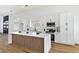 Bright kitchen with island, modern appliances, and stylish cabinetry at 4117 Sinew Ct, Las Vegas, NV 89129