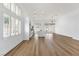 Open concept living room with wood-style floors and natural light at 4117 Sinew Ct, Las Vegas, NV 89129