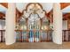 Upper-level view showcasing exquisite chandeliers, decorative woodwork, and views to golf course and pool at 42 Gulf Stream Ct, Las Vegas, NV 89113