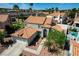 Two-story home with tile roof, desert landscaping, and a spacious driveway in a quiet neighborhood at 5 Tarryall Ter, Henderson, NV 89074