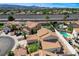 Overhead shot of a home featuring a tile roof, pool, and desert landscaping in a residential area at 5 Tarryall Ter, Henderson, NV 89074