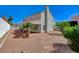 Spacious backyard with gravel, stone accents, and covered patio, perfect for outdoor relaxation at 5 Tarryall Ter, Henderson, NV 89074
