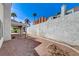 The property includes a private backyard with stone landscaping and a covered patio area at 5 Tarryall Ter, Henderson, NV 89074