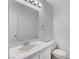 Bathroom features a tiled vanity, ample lighting and white fixtures at 5 Tarryall Ter, Henderson, NV 89074