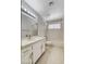 This bathroom features tiled counters, a vanity with a mirror, and a shower/tub combo at 5 Tarryall Ter, Henderson, NV 89074