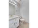 Bathroom features a tiled vanity, ample lighting and white fixtures at 5 Tarryall Ter, Henderson, NV 89074