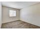 This bedroom features neutral walls, carpeted floors, and a window at 5 Tarryall Ter, Henderson, NV 89074
