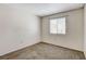 This bedroom features neutral walls, carpeted floors, and a window at 5 Tarryall Ter, Henderson, NV 89074