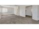 Carpeted bedroom with access to the bathroom and a double door closet for storage at 5 Tarryall Ter, Henderson, NV 89074