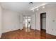 Bedroom with laminate floors, closet, and an open doorway leading to another room at 5 Tarryall Ter, Henderson, NV 89074