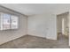 This bedroom features neutral walls, carpeted floors, and a window at 5 Tarryall Ter, Henderson, NV 89074