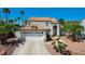 Charming two-story home featuring a two-car garage and desert landscaping at 5 Tarryall Ter, Henderson, NV 89074