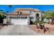 Charming two-story home featuring a terracotta roof, stucco siding, and a well-maintained front yard at 5 Tarryall Ter, Henderson, NV 89074