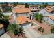 Aerial view of house featuring desert landscaping and a spacious driveway and two-car garage at 5 Tarryall Ter, Henderson, NV 89074