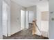 Hallway features neutral paint, carpet, and access to other rooms at 5 Tarryall Ter, Henderson, NV 89074