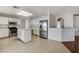 Bright kitchen featuring white cabinets, stainless steel appliances, and a functional center island at 5 Tarryall Ter, Henderson, NV 89074
