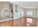 Open-concept living room featuring wood floors, chandelier, staircase and lots of light at 5 Tarryall Ter, Henderson, NV 89074