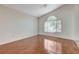 Bright living room with wood floors and a large window allowing for lots of natural light at 5 Tarryall Ter, Henderson, NV 89074