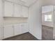 Hallway featuring storage cabinets and access to other rooms at 5 Tarryall Ter, Henderson, NV 89074