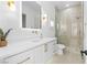 Elegant bathroom featuring double vanity, modern fixtures, and a glass enclosed shower at 5225 Villa Dante Ave, Las Vegas, NV 89141