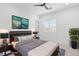 Modern bedroom with stylish decor, shutters, and cozy furnishings at 5225 Villa Dante Ave, Las Vegas, NV 89141