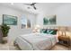 Light and airy bedroom with serene decor, plantation shutters, and ample natural light at 5225 Villa Dante Ave, Las Vegas, NV 89141