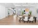 Spacious dining room with modern chandelier and an open floor plan at 5225 Villa Dante Ave, Las Vegas, NV 89141