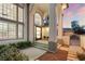 Inviting home featuring a grand entrance with a well-manicured front yard, and stunning sunset sky at 5225 Villa Dante Ave, Las Vegas, NV 89141