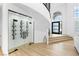 Modern home with a wine cellar next to the staircase at 5225 Villa Dante Ave, Las Vegas, NV 89141