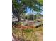 Backyard with raised garden beds and roses at 5317 Holmby Ave, Las Vegas, NV 89146
